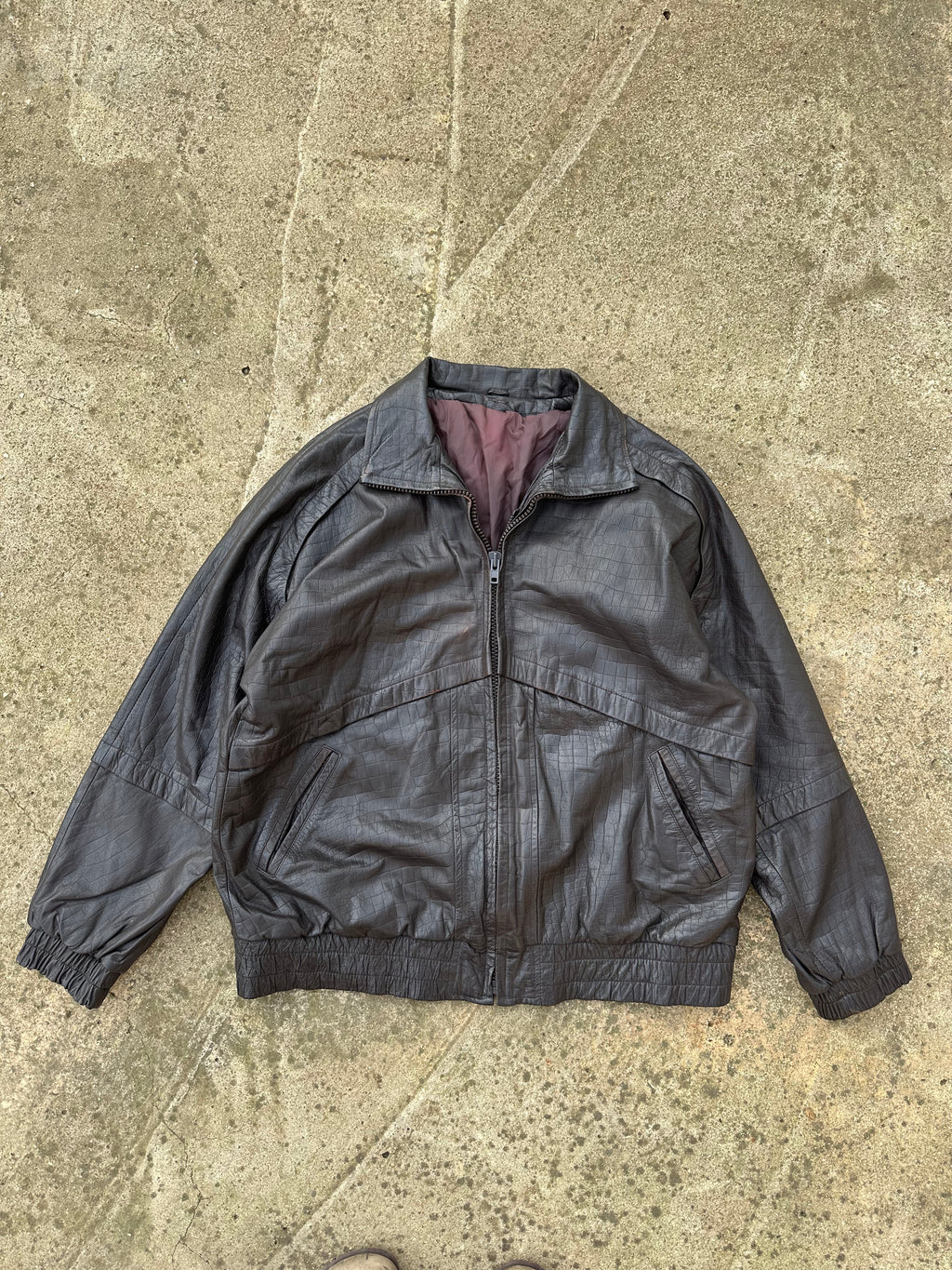 Brown leather jacket w/ crocodile patterns