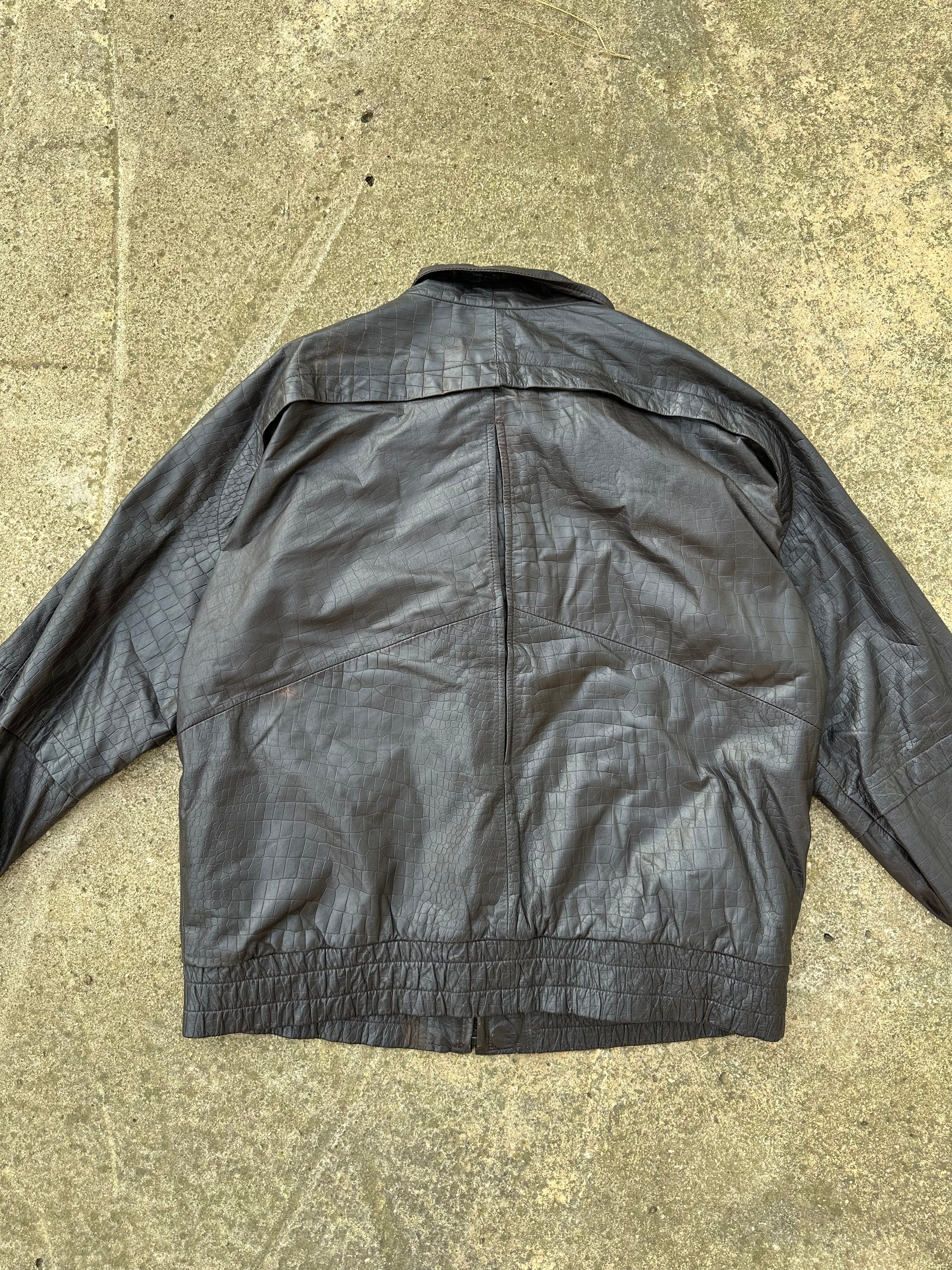 Brown leather jacket w/ crocodile patterns