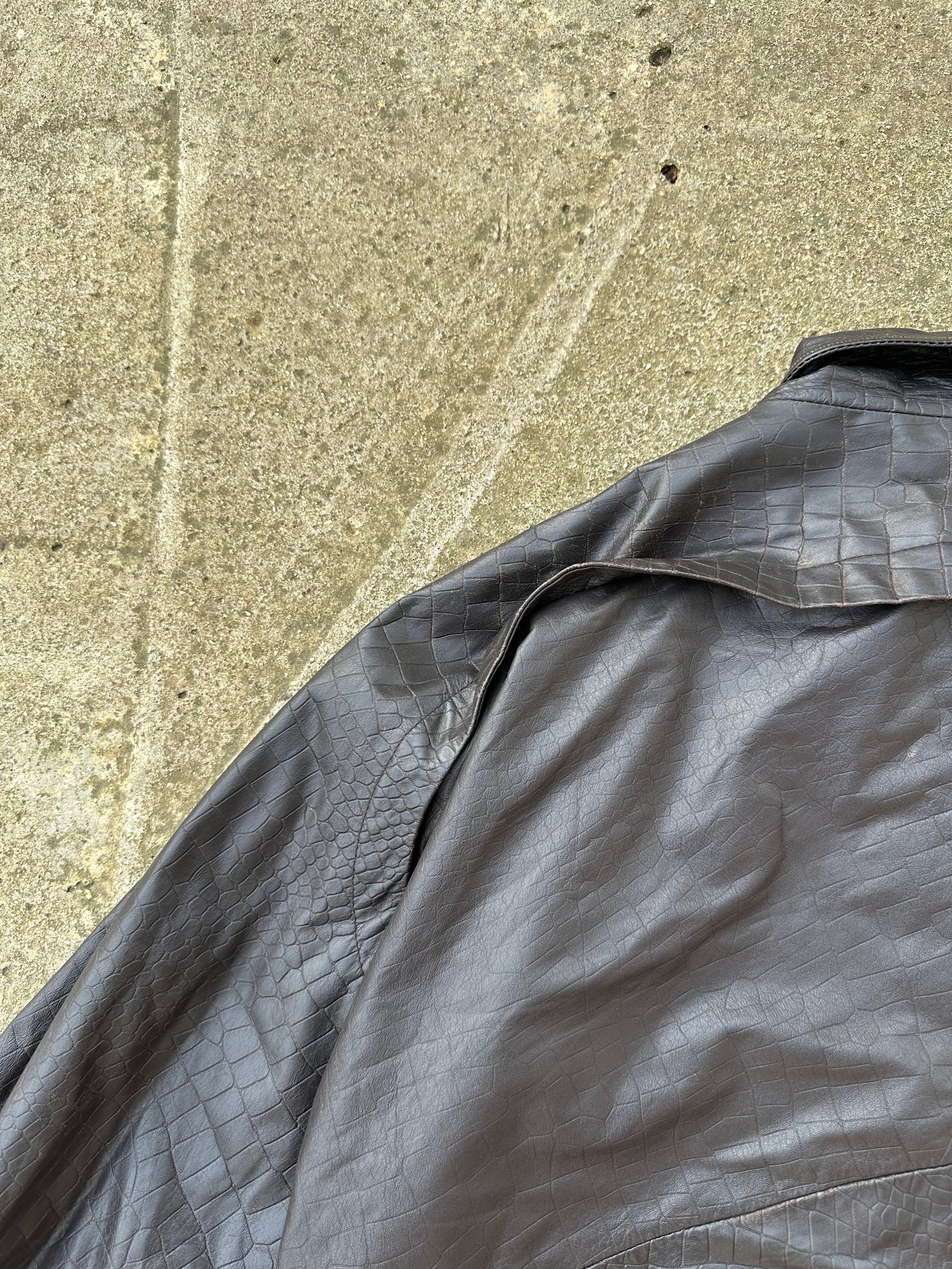 Brown leather jacket w/ crocodile patterns